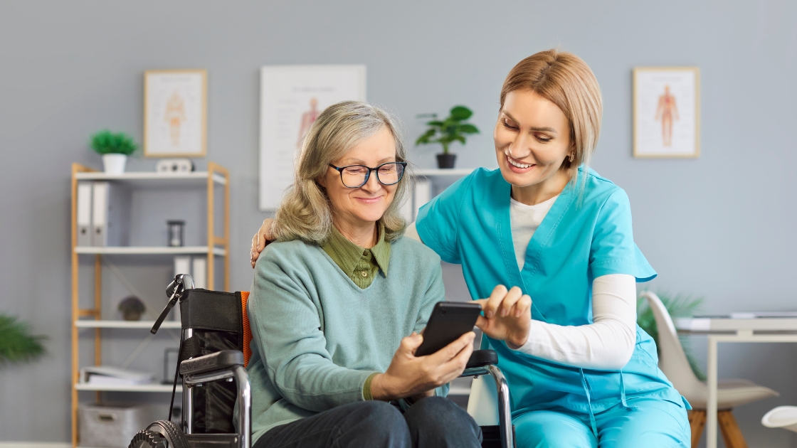 Nurse helping person in wheelchair
